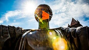 Alma mater statue in the sunlight