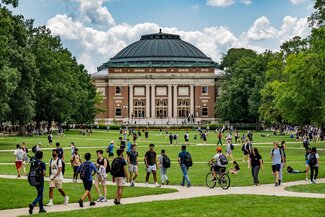 Illinois main quad during passing period with students walking